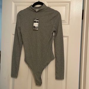 Just Polly medium sized light grey bodysuit